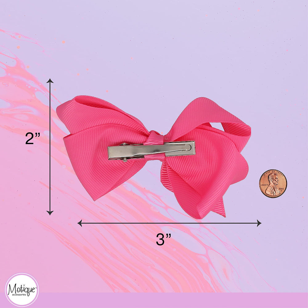 Motique Accessories bow clipped in a child's hair demonstrating comfortable wear and style