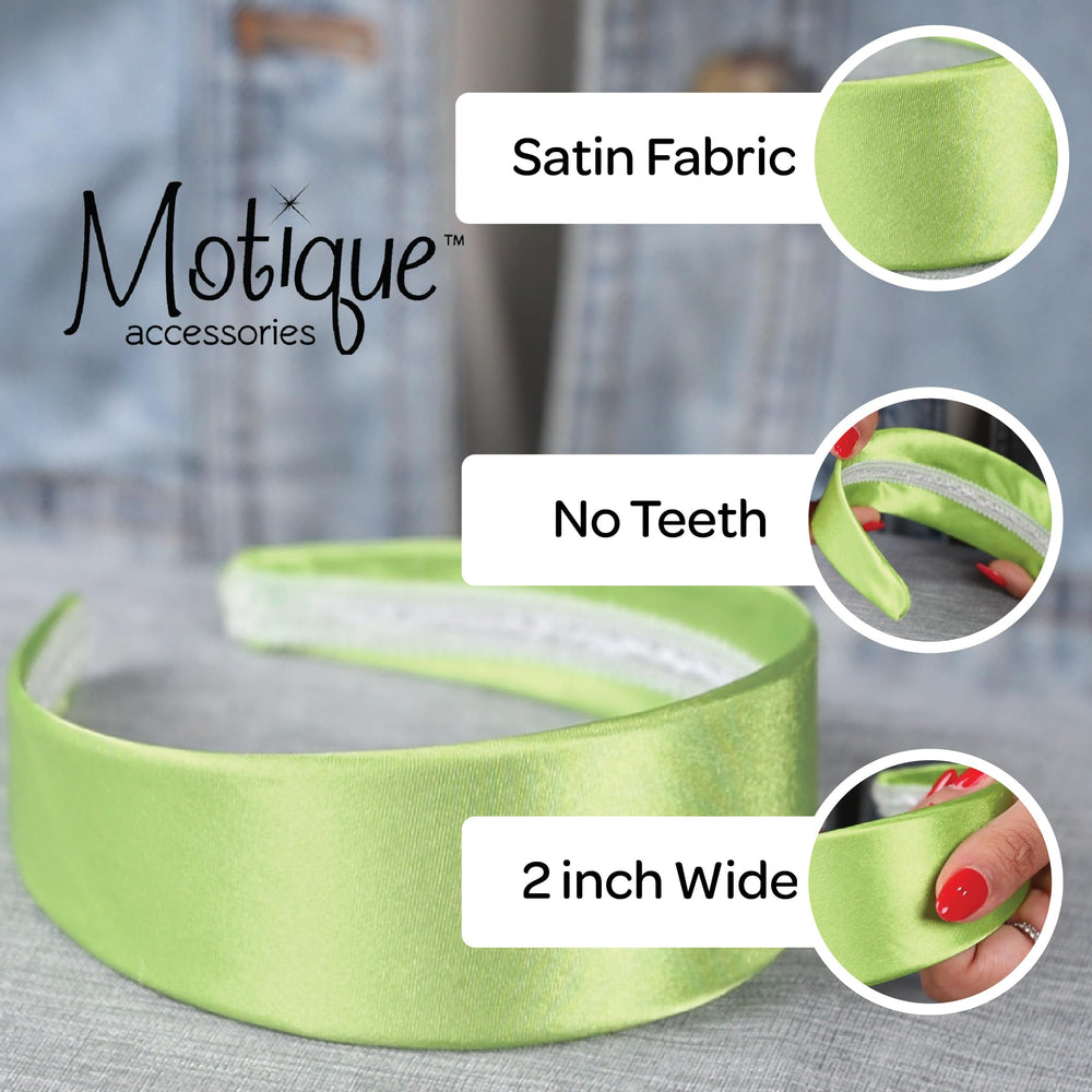 Motique Accessories navy headband held in hand for size comparison showing 2-inch width