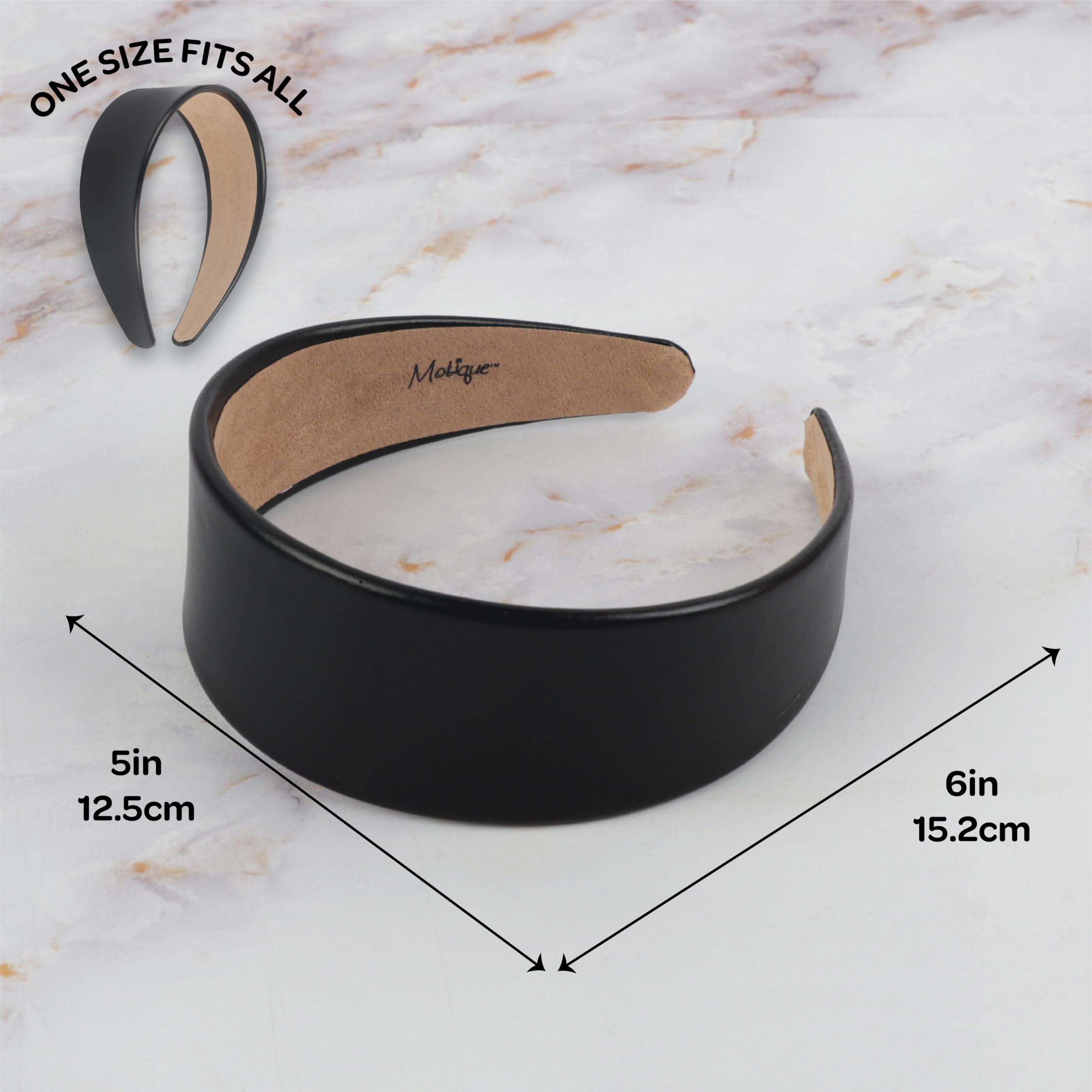 Motique Accessories headband beside hand for size comparison and fit clarity
