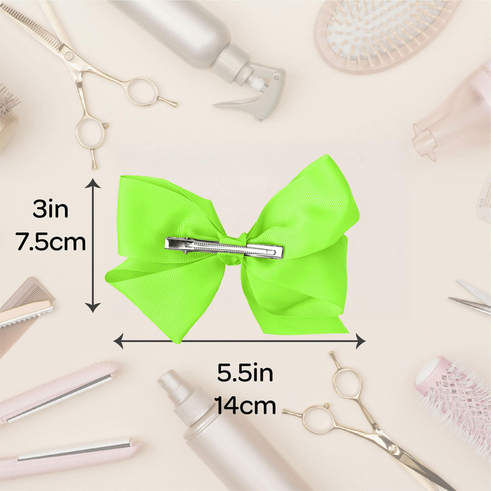 Motique Accessories next to ruler showing 5.5 inch size for clear scale