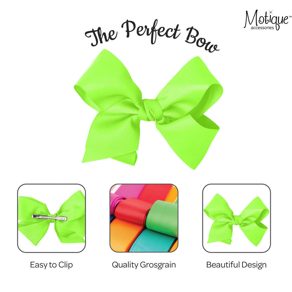 Motique Accessories worn in a ponytail showcasing pop of color and styling