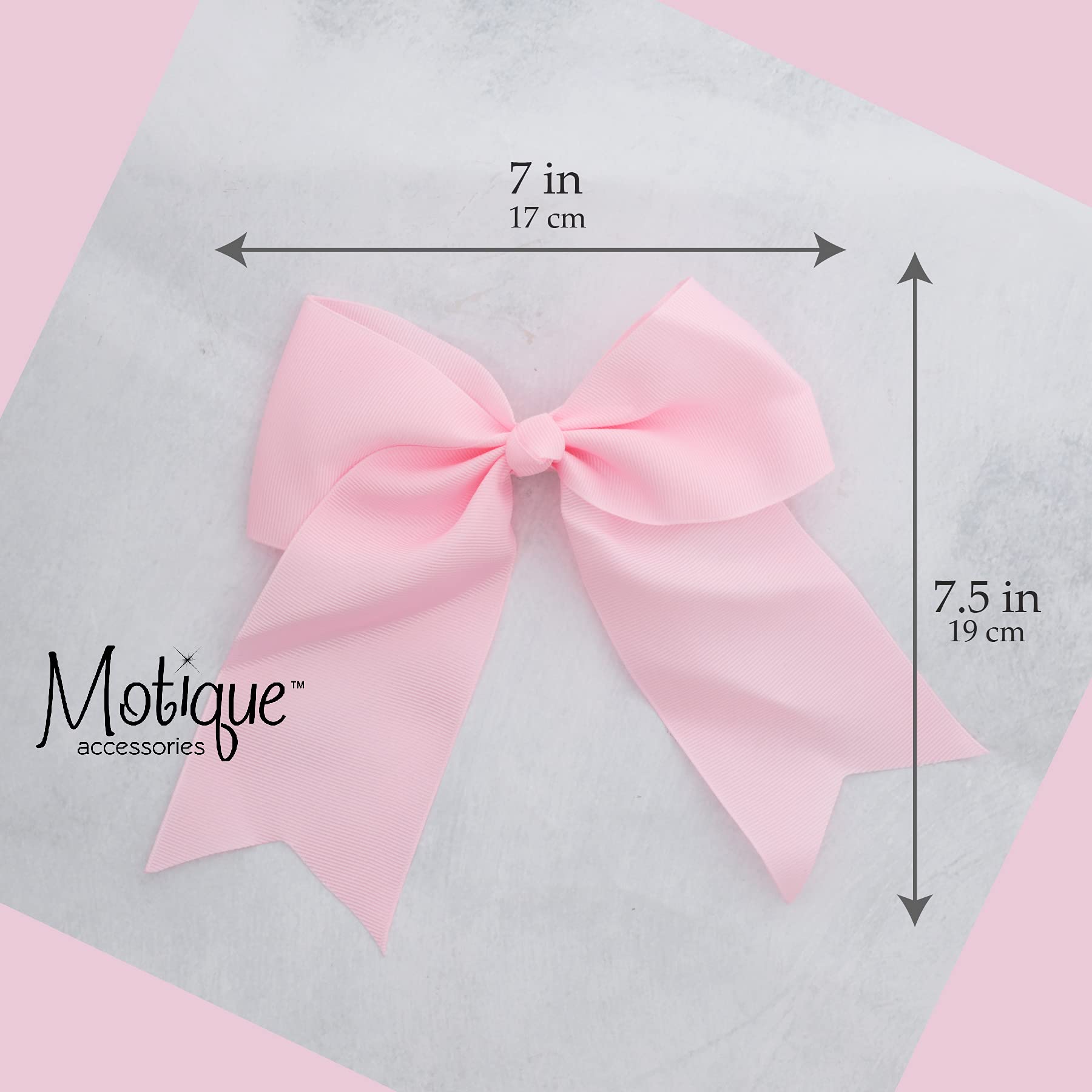 Motique Accessories bow beside ruler for size comparison benefit: clear scale of 7-inch width