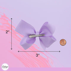 Motique Accessories bow in hair on young girl demonstrating stylish, comfortable wear