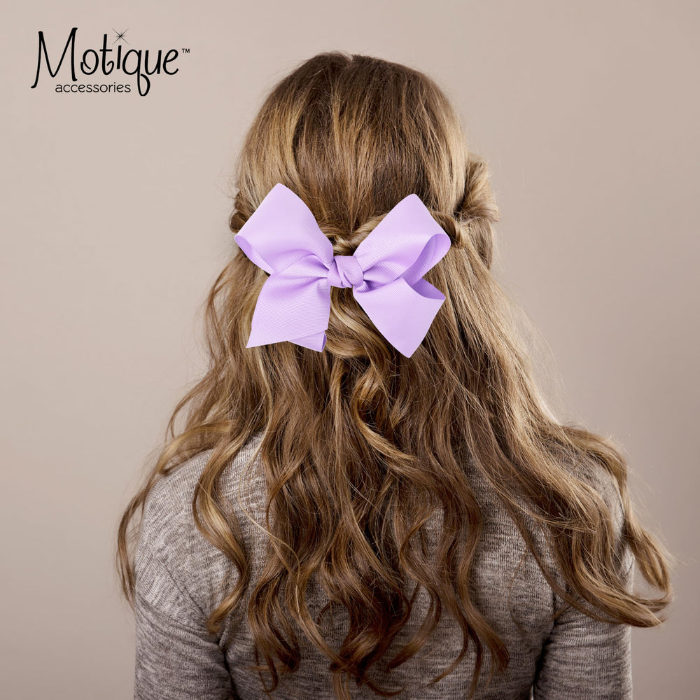 Motique Accessories close-up of grosgrain texture, shows crisp ribbon detail