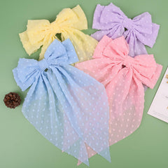 MRJ close-up chiffon texture of bow fabric highlighting soft drape and sheen