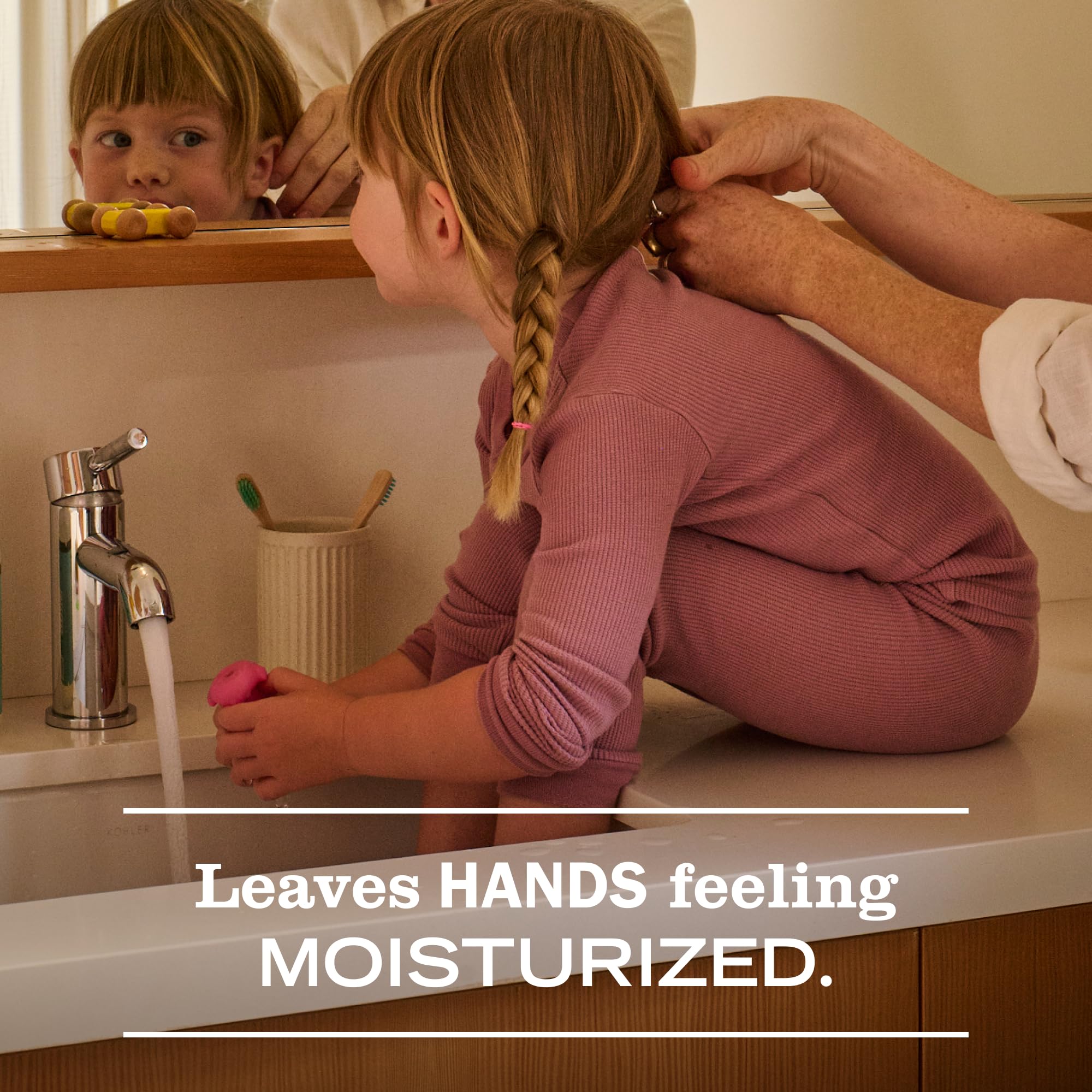 Mrs. MEYER'S foamy texture on hand illustrating gentle lather and softening effect