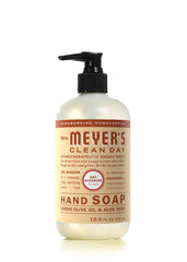 Mrs. MEYER'S size comparison with hand to show compact 12.5 oz bottle portability and space saving