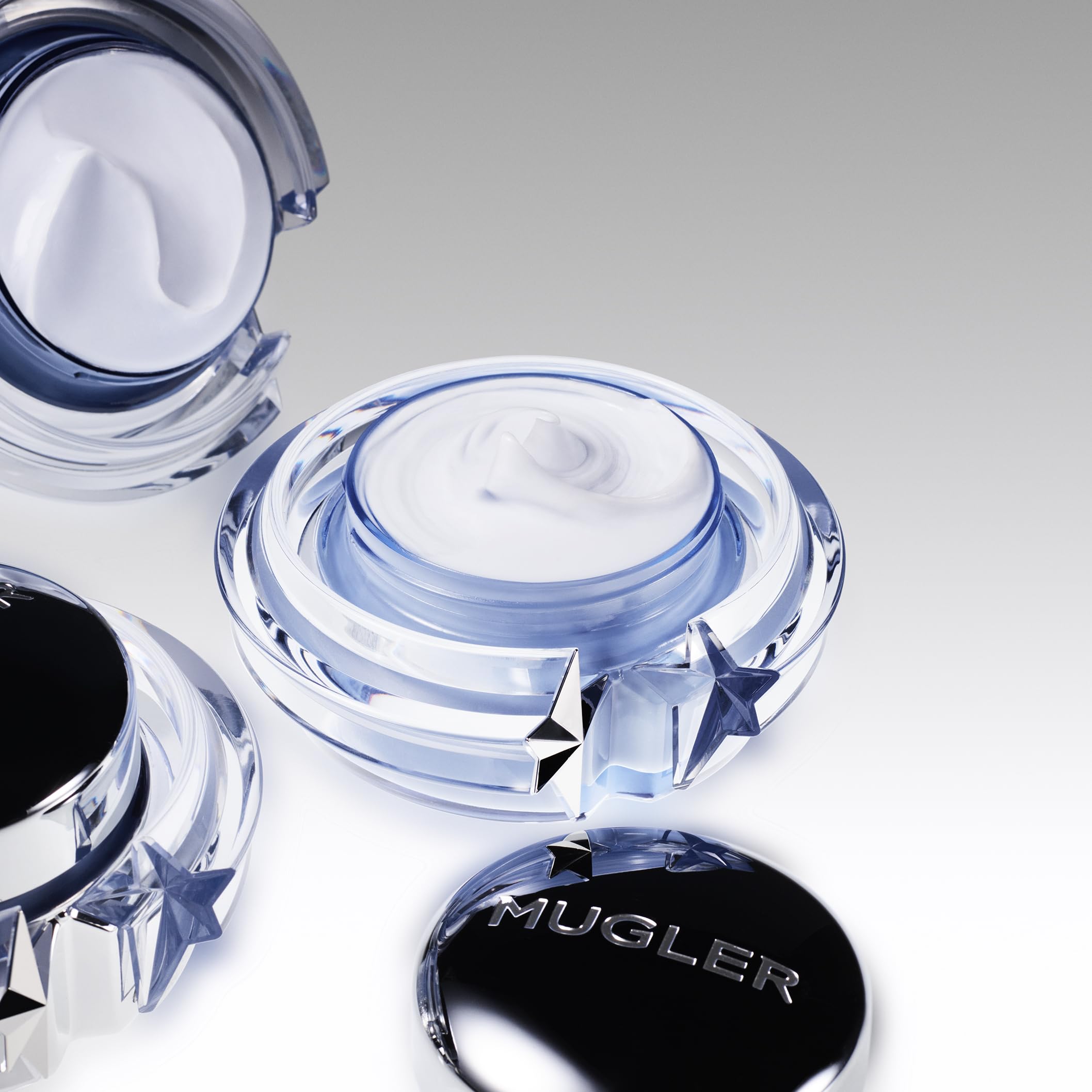 Mugler Angel cream applied on hand demonstrating smooth absorption and softness