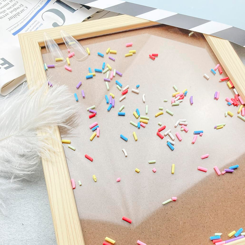 Mulutoo sprinkles on a craft table with tools, inspiring DIY project ideas