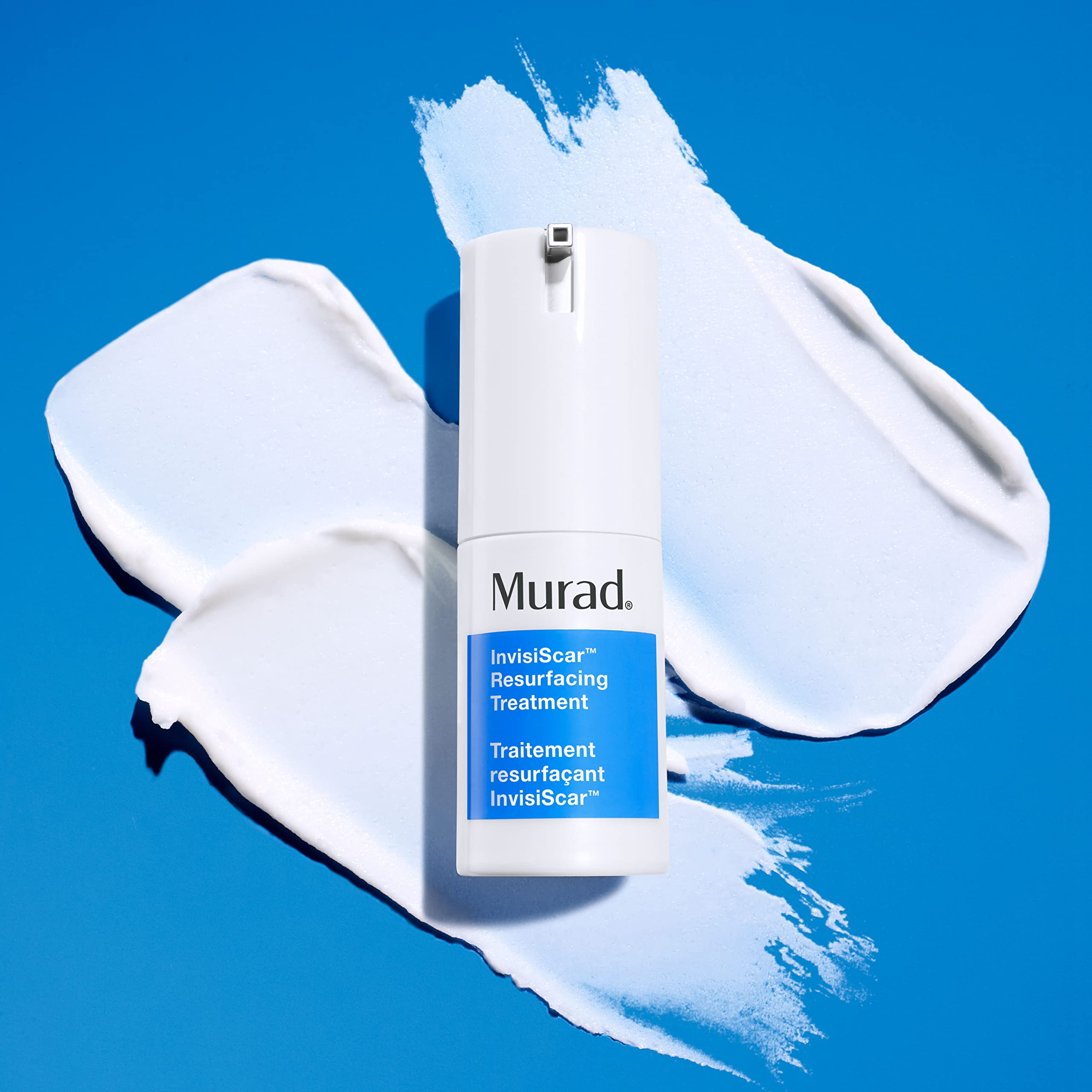 Murad InvisiScar serum on fingertip demonstrating lightweight spreadable texture