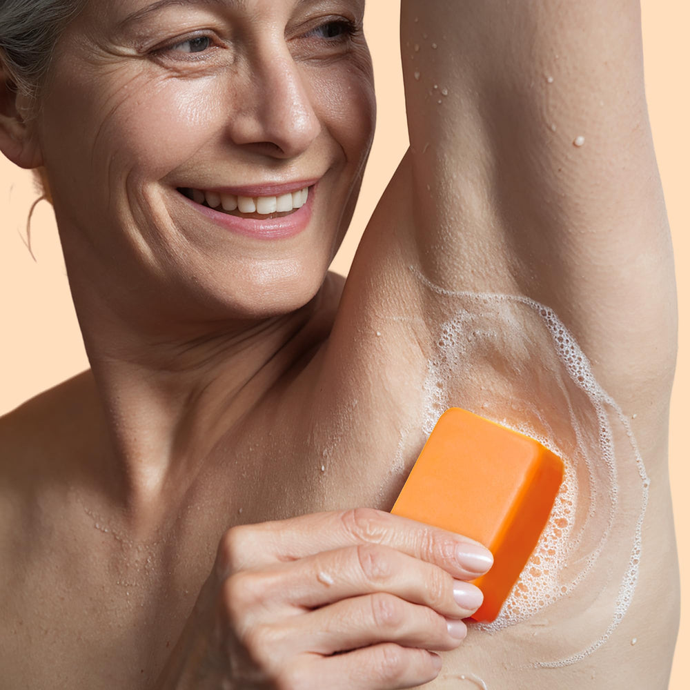 Muun persimmon soap lather in hand demonstrating rich foam for deeper cleanse