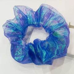 MUYANN scrunchies glowing at a party demonstrating visible night-time impact