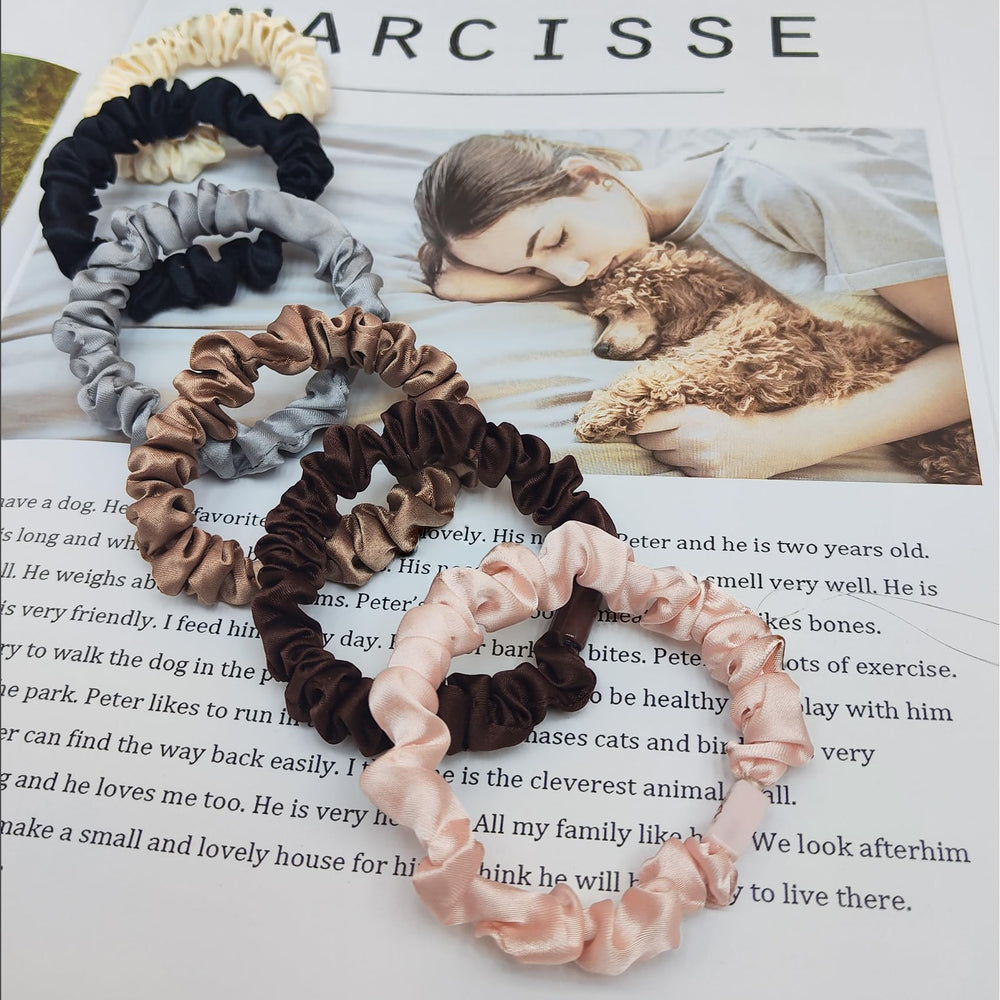 MUYANN scrunchie in hand showing size and lightweight comfort