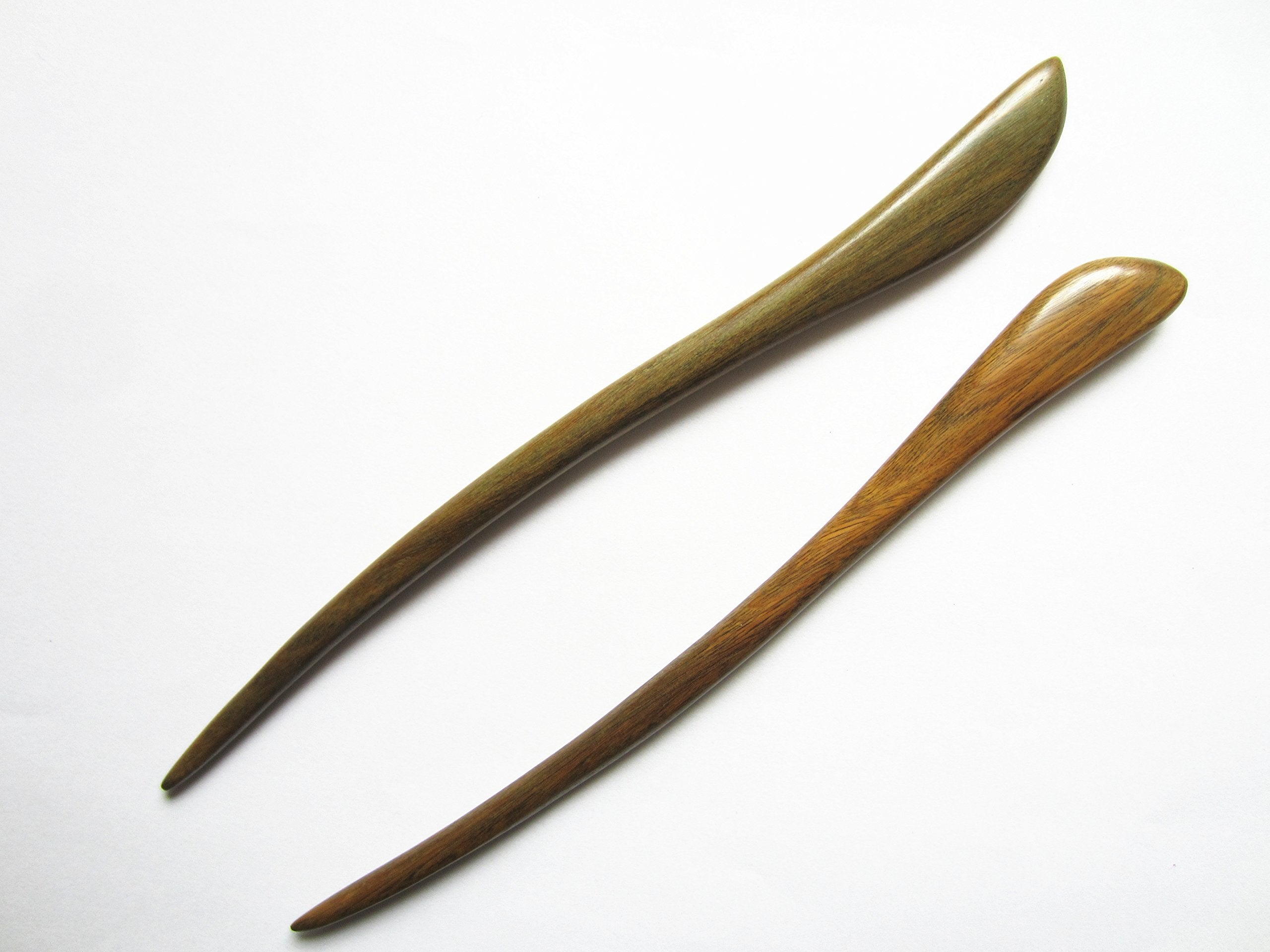 Myhsmooth front view of two carved green sandalwood hair sticks for strong hold