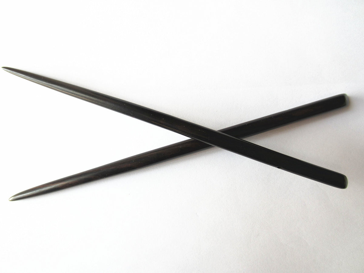 Myhsmooth front view of two hair sticks showing shape and length for secure hold