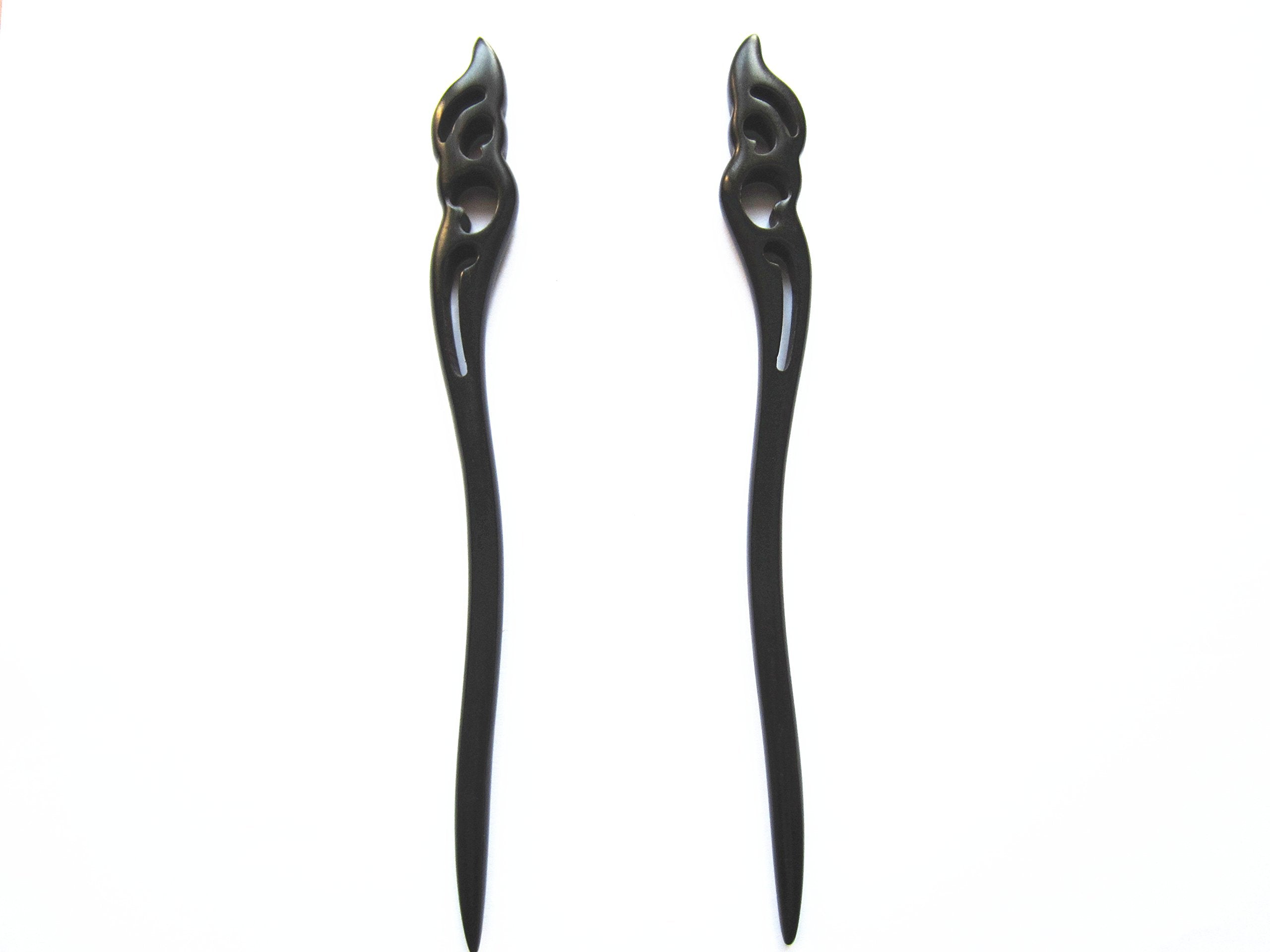 Myhsmooth front view of two ebony sticks showing elegant hold the moon carving and secure styling benefit