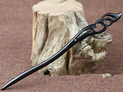 Myhsmooth hair-in-use showing stick securing a bun for stable all-day hold without pins