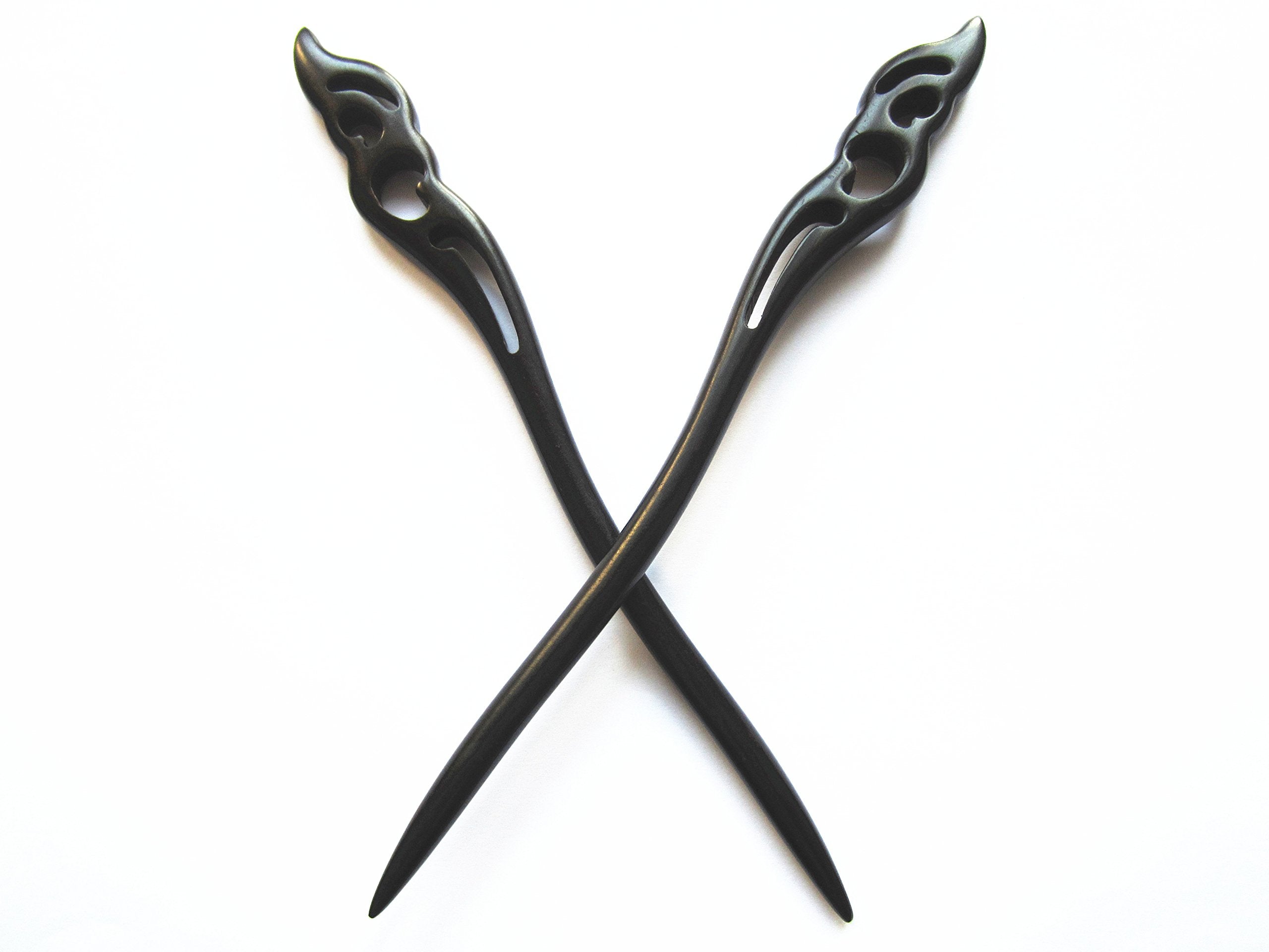 Myhsmooth texture close-up of black sandalwood grain highlighting smooth finish and gentle hair glide