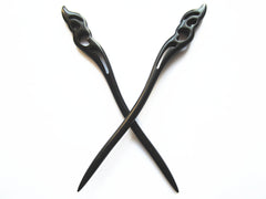 Myhsmooth texture close-up of black sandalwood grain highlighting smooth finish and gentle hair glide