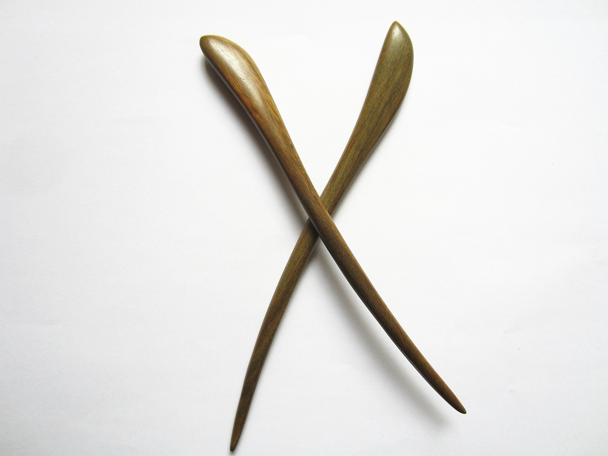 Myhsmooth hair bun with sticks in place demonstrating secure, elegant hold