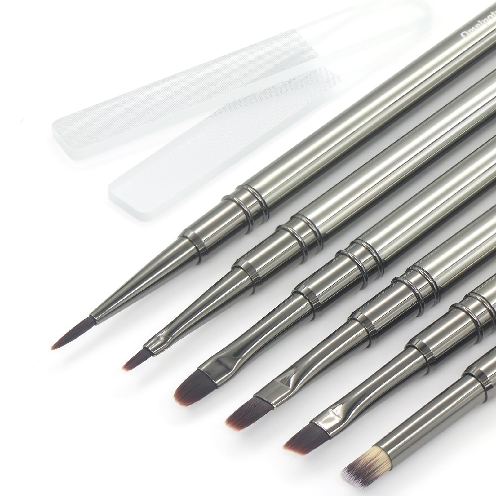 MYR front layout of metal nail brush set showing tools and files for versatile designs