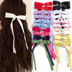 Mythos front packaging view showing all 20 bow clips for organized styling
