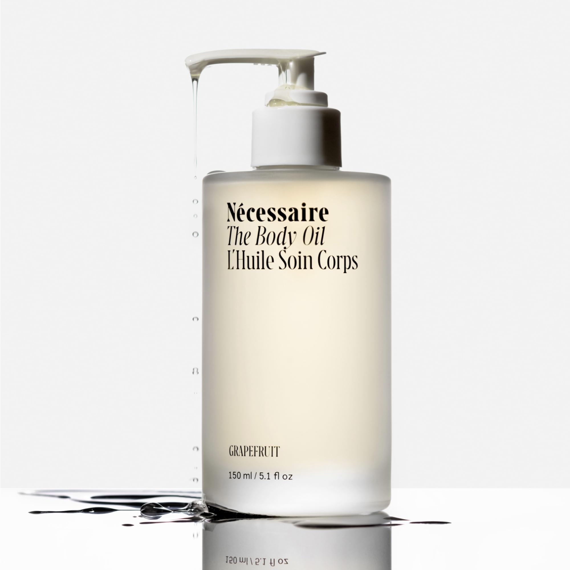 Nécessaire body oil texture on dropper highlighting fast absorption benefit