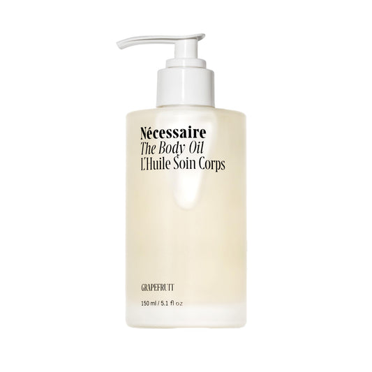 Nécessaire The Body Oil front bottle showing sleek packaging and product benefit