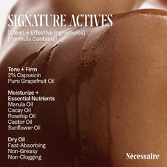 Applying Nécessaire body oil in hand to demonstrate smoothing and moisturizing benefit