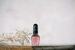 Droplet texture of Nail Magic top coat showing smooth formula and easy application benefit