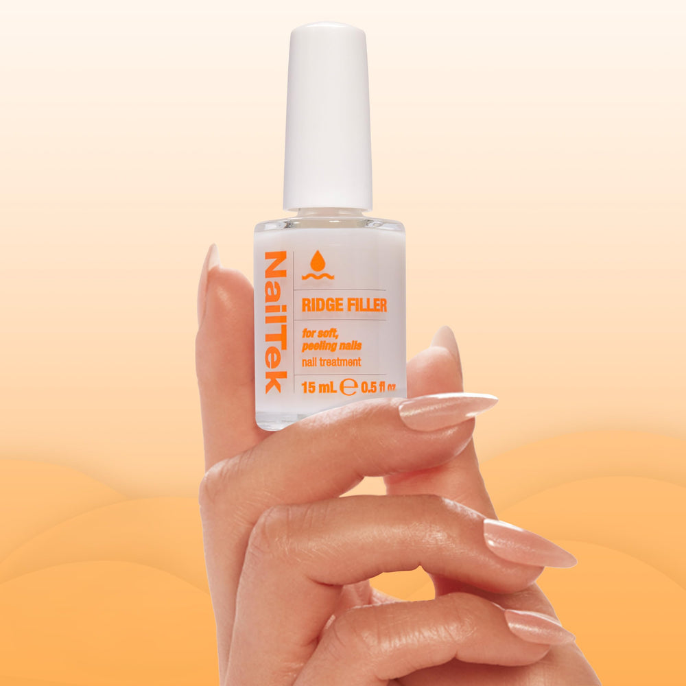 Nail Tek applied on natural nails demonstrating visible ridge smoothing benefit