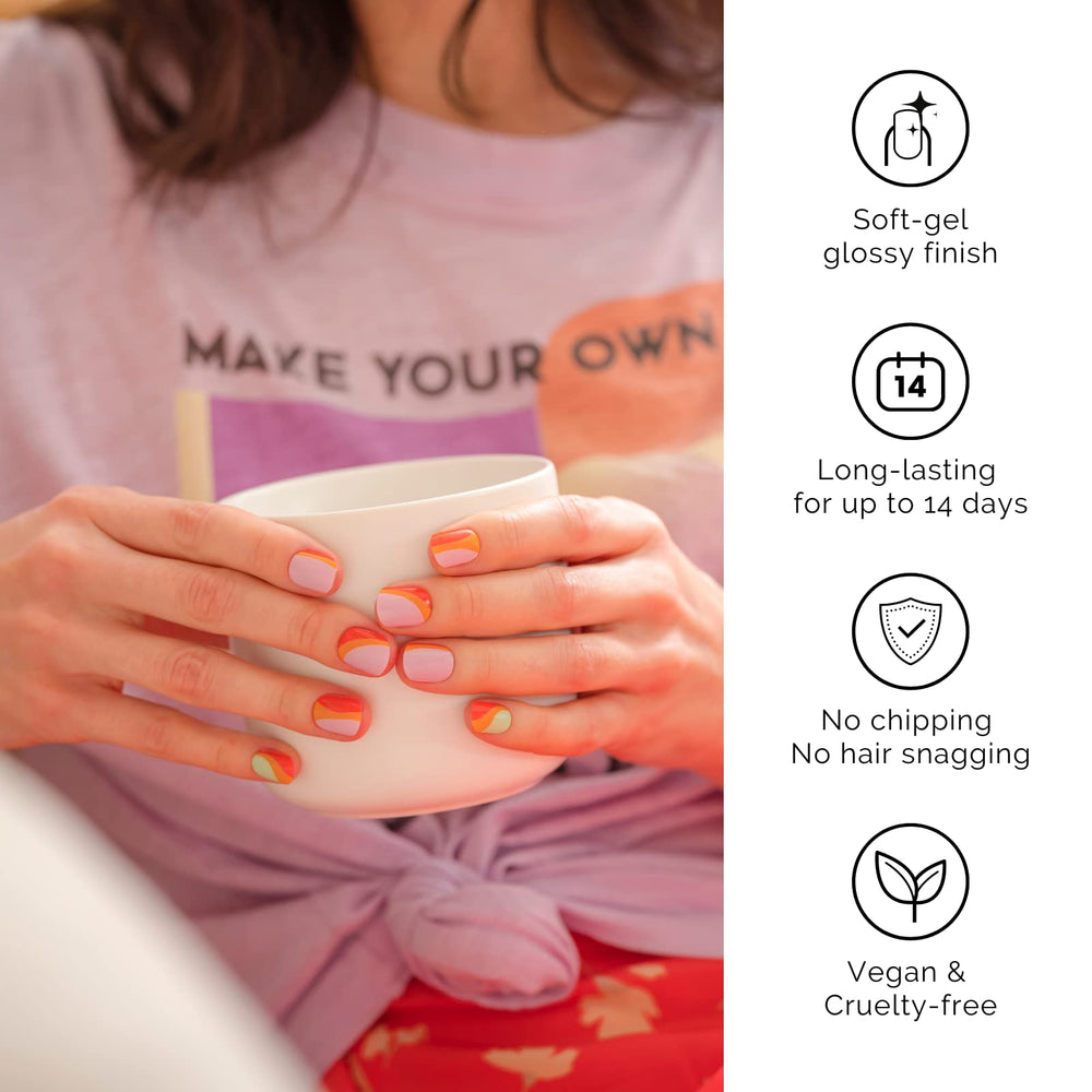 NAILOG lifestyle shot of manicured hands wearing lollipop design, polished look