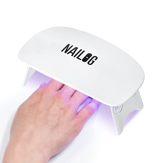 NAILOG mini front view showing compact lamp and button, quick curing benefit
