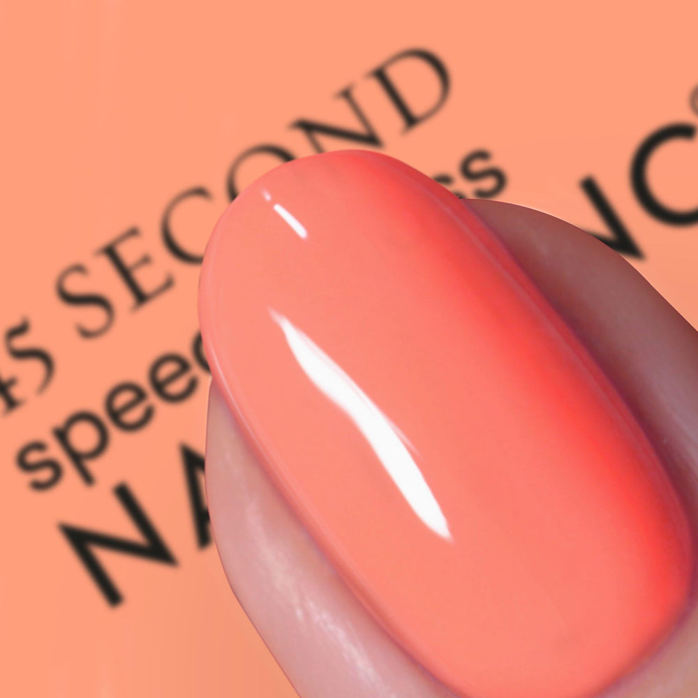 Nails Inc Bella brush close-up demonstrating wide hugging brush for precision