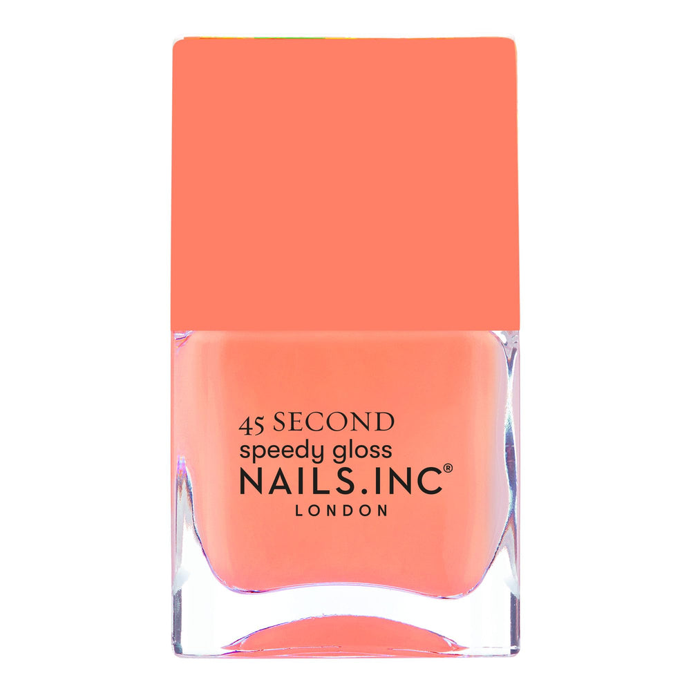 Nails Inc Bella front bottle showing pastel coral shade and quick-dry benefit