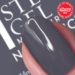Nails Inc close-up of wide hugging brush delivering even coverage benefit