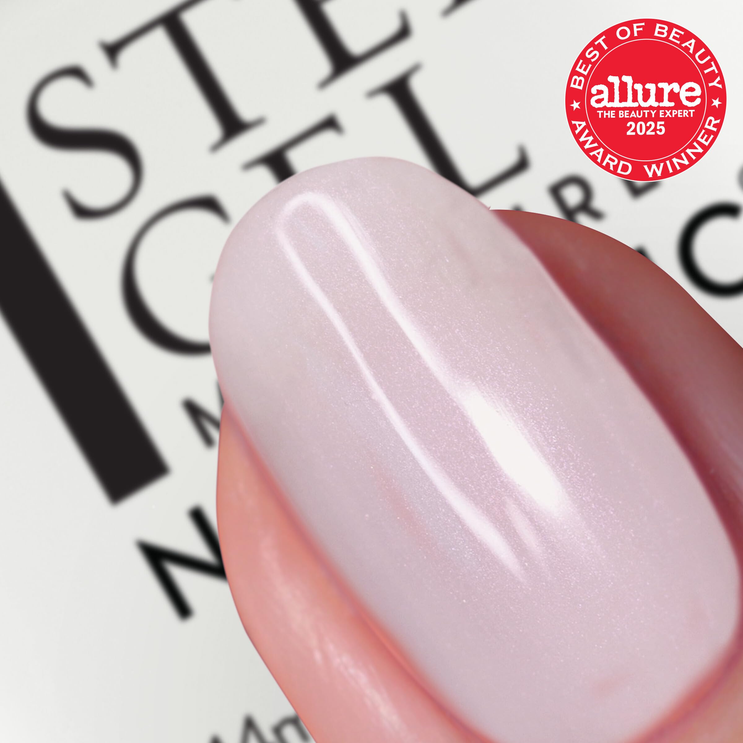 Nails Inc It’s Topless Emma patented wide brush up close for fast, even application and fewer strokes