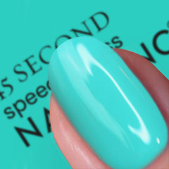 Nails Inc Mila brush close-up demonstrating wide brush for fast application benefit