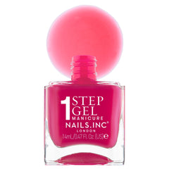 Nails Inc bottle held in hand to show scale and travel-friendly size benefit