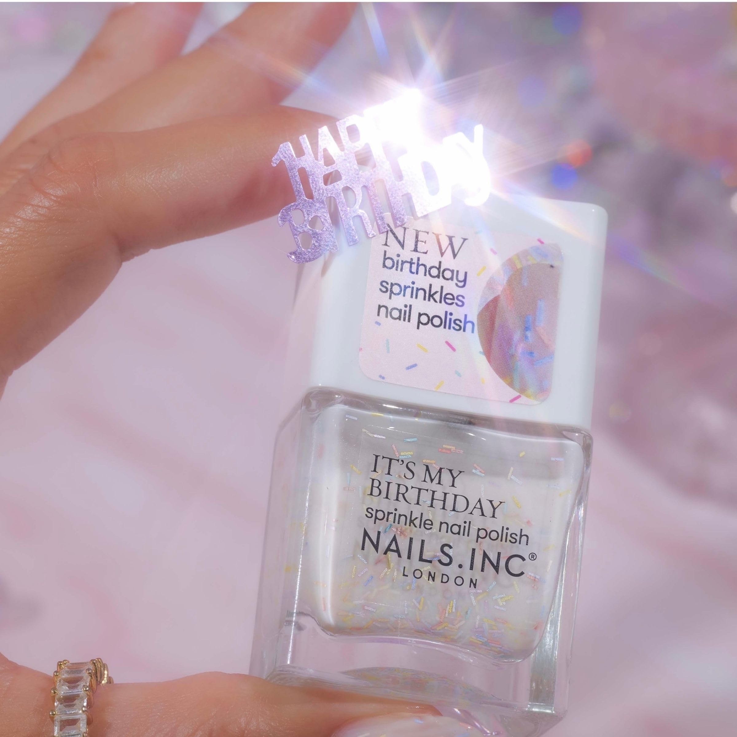 Nails Inc nail swatch showing multicolor sprinkle effect and coverage