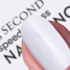 Nails Inc brush close-up demonstrating wide hugging brush for precise speedy application