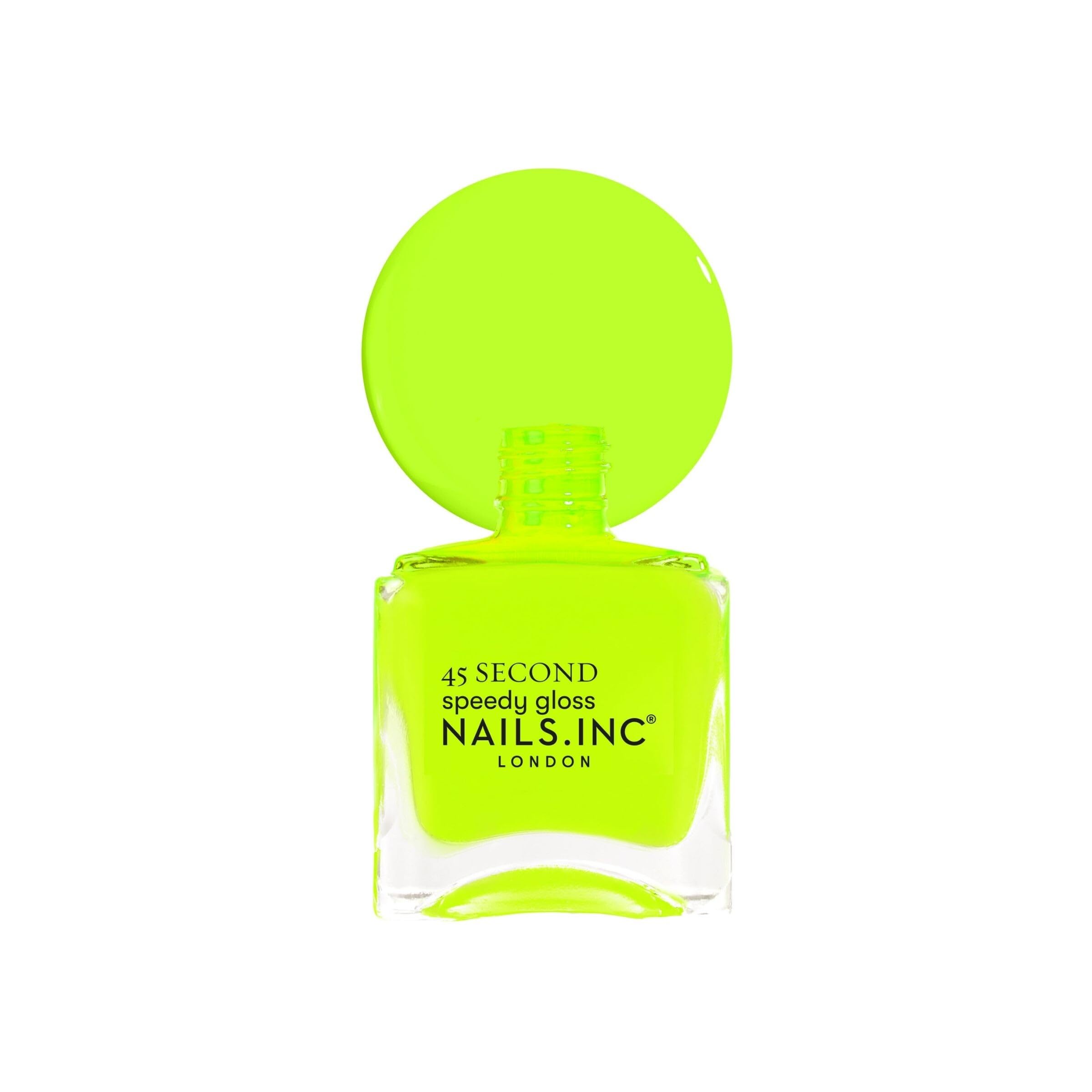 Nails Inc Daisy bottle next to ruler to show 0.47 fl oz scale