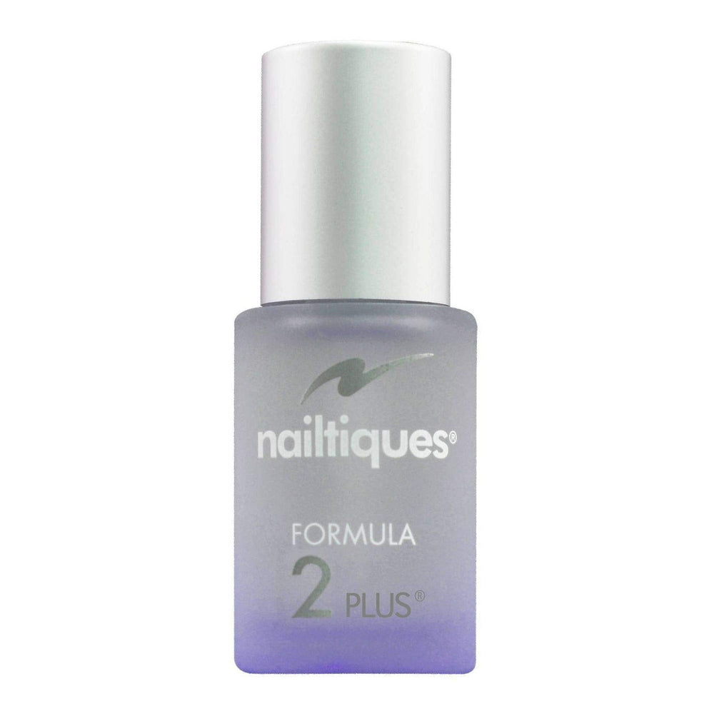 Nailtiques Formula 2 application closeup on natural nail demonstrating strengthening benefit