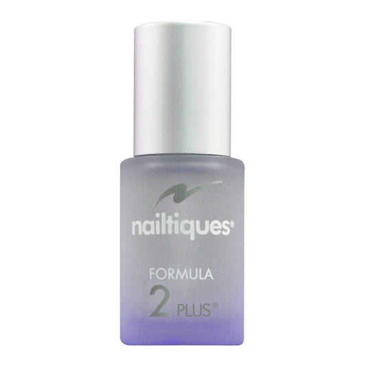 Nailtiques Formula 2 application closeup on natural nail demonstrating strengthening benefit