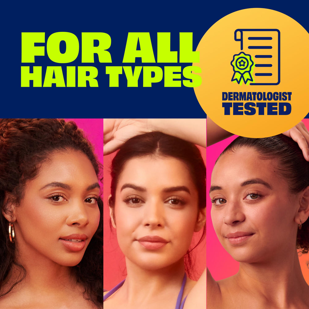 Nair bottle held by a hand to show 7.5 oz scale