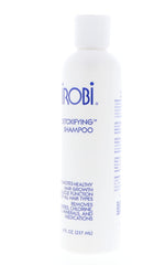 Nairobi shampoo pouring texture to show viscosity and gentle cleansing benefit