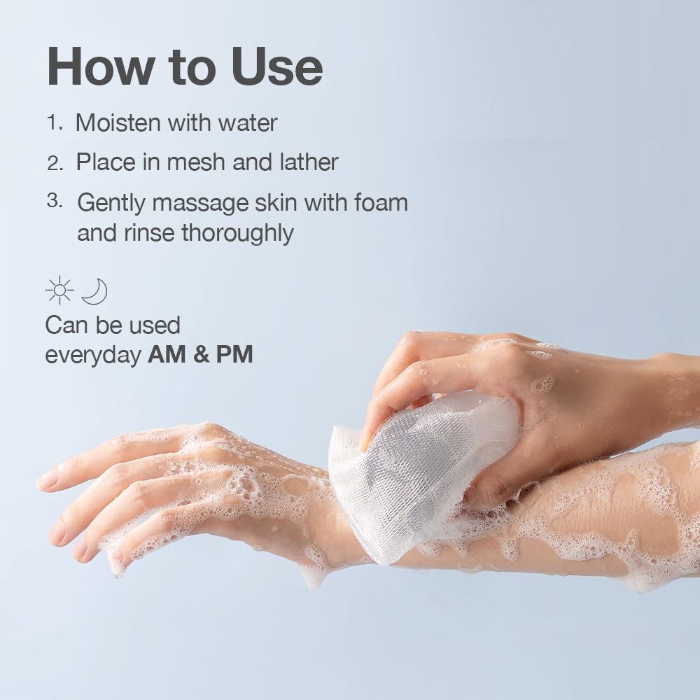 Naisture cleanser lather on palm showing gentle foam and cleansing action