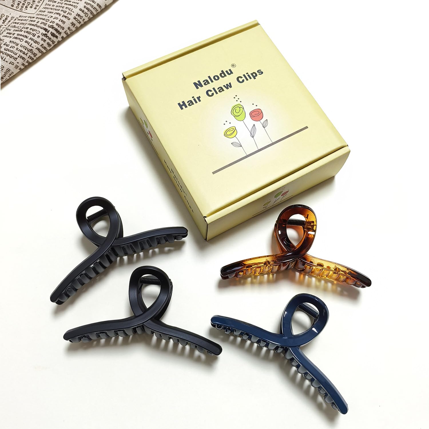 Nalodu clip holding a high bun, comfortable all-day wear