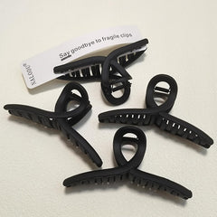 Nalodu front view of matte black 5-inch claw clip showing solid grip benefit