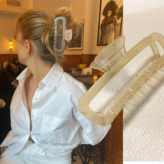 Nalodu clip holding a high bun on thick hair for all-day convenience